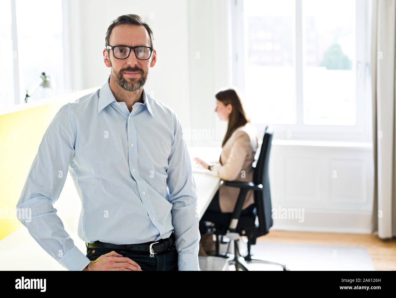 Confident employee office hi-res stock photography and images - Alamy