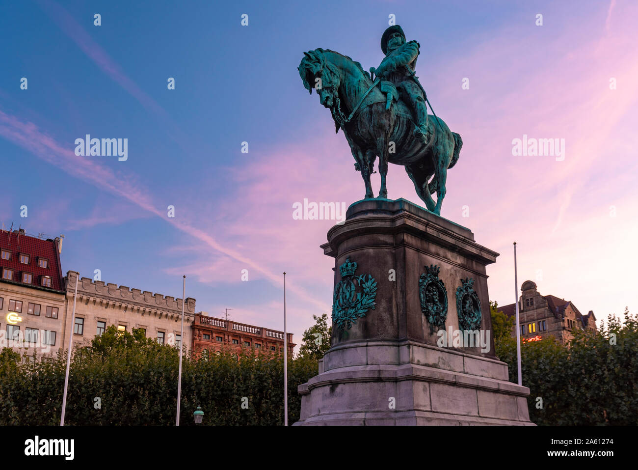 Low angle view of Charles X Gustav statue against sky during sunset, Malmo, Sweden Stock Photo
