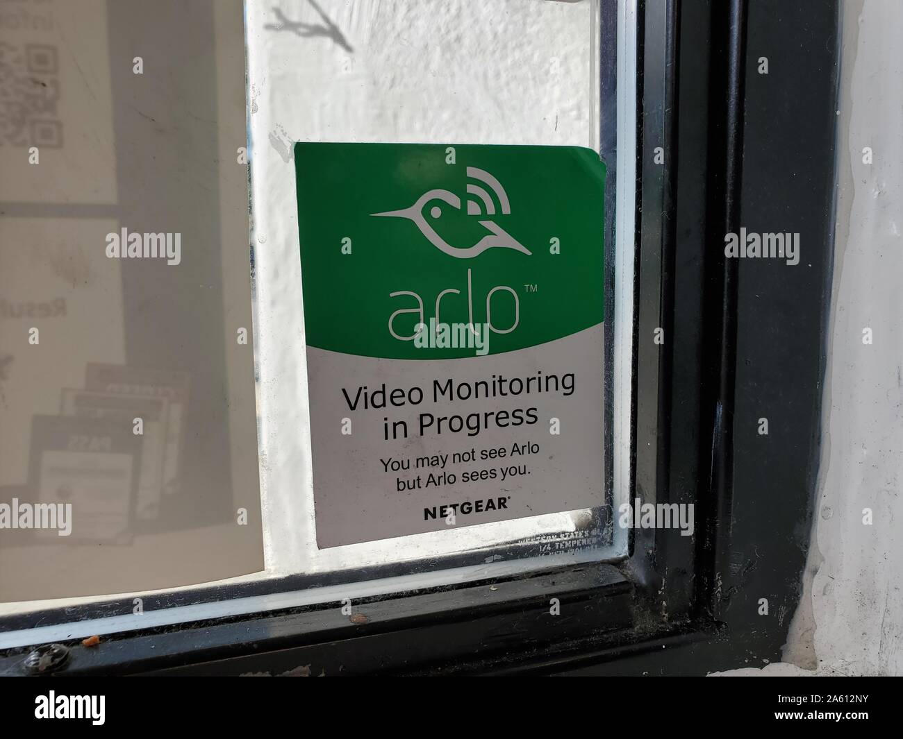 Close-up of window decal for Arlo web-enabled surveillance system from technology company Netgear in the window of a store in Walnut Creek, California, September 27, 2019. () Stock Photo