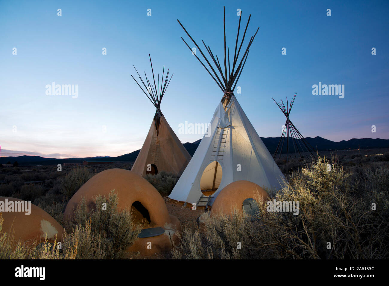 Teepees (tipis) on display at dusk in Taos, New Mexico, United States
