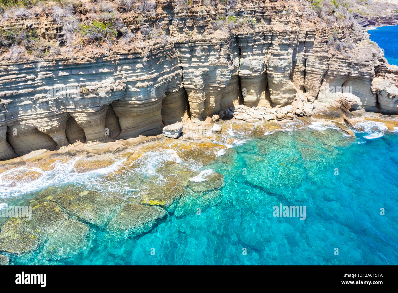 White limestone cliffs Pillar of Hercules washed by Caribbean Sea
