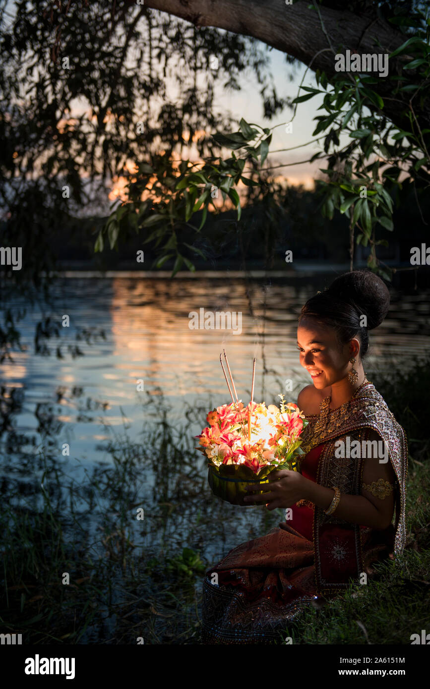 Loi Krathong festival with woman Stock Photo