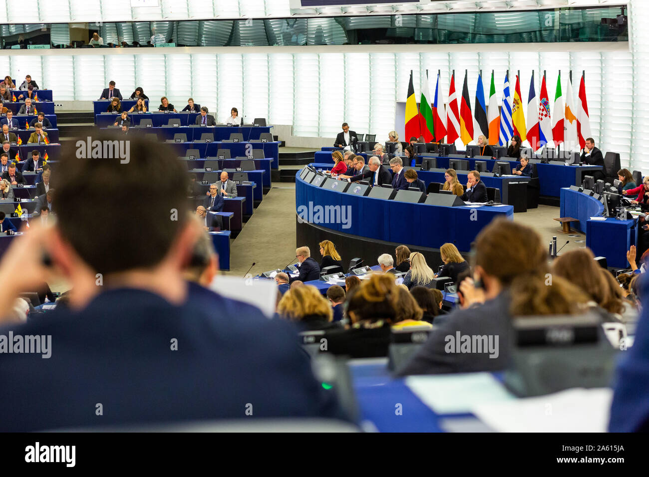 Strasbourg, France. 23rd Oct, 2019. Members of the European Parliament vote in plenary on the European Union's draft budget for the fiscal year 2020. On Wednesday the EU Parliament voted by a large majority in favour of anchoring more than two billion euros for climate protection in the planned EU budget for the coming year. In total, the budget for 2020 is to amount to around 159 billion euros - around 2.7 billion euros more than the EU Commission's proposal. Photo: Philipp von Ditfurth/dpa Credit: dpa picture alliance/Alamy Live News Stock Photo