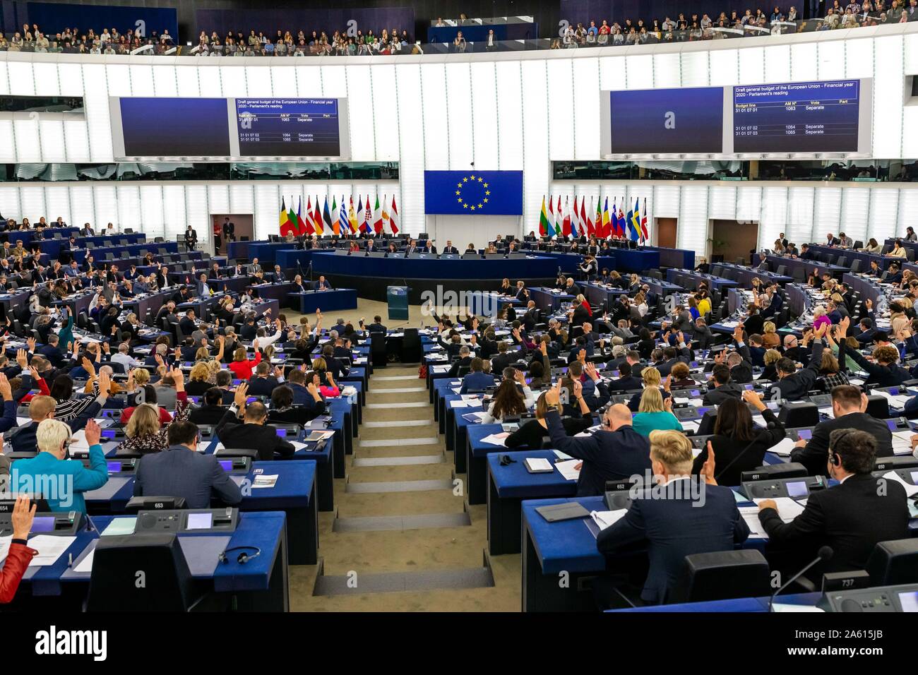 Strasbourg, France. 23rd Oct, 2019. Members of the European Parliament vote in plenary on the European Union's draft budget for the fiscal year 2020. On Wednesday the EU Parliament voted by a large majority in favour of anchoring more than two billion euros for climate protection in the planned EU budget for the coming year. In total, the budget for 2020 is to amount to around 159 billion euros - around 2.7 billion euros more than the EU Commission's proposal. Photo: Philipp von Ditfurth/dpa Credit: dpa picture alliance/Alamy Live News Stock Photo