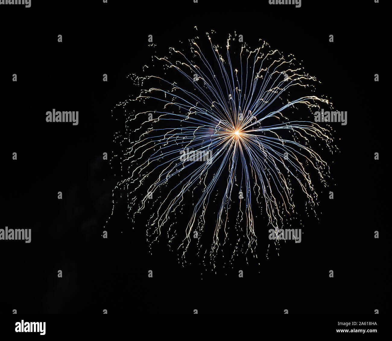 Fireworks photographed in the night sky with a long exposure and black background high quality image good for pc backgrounds and fine art prints. Stock Photo