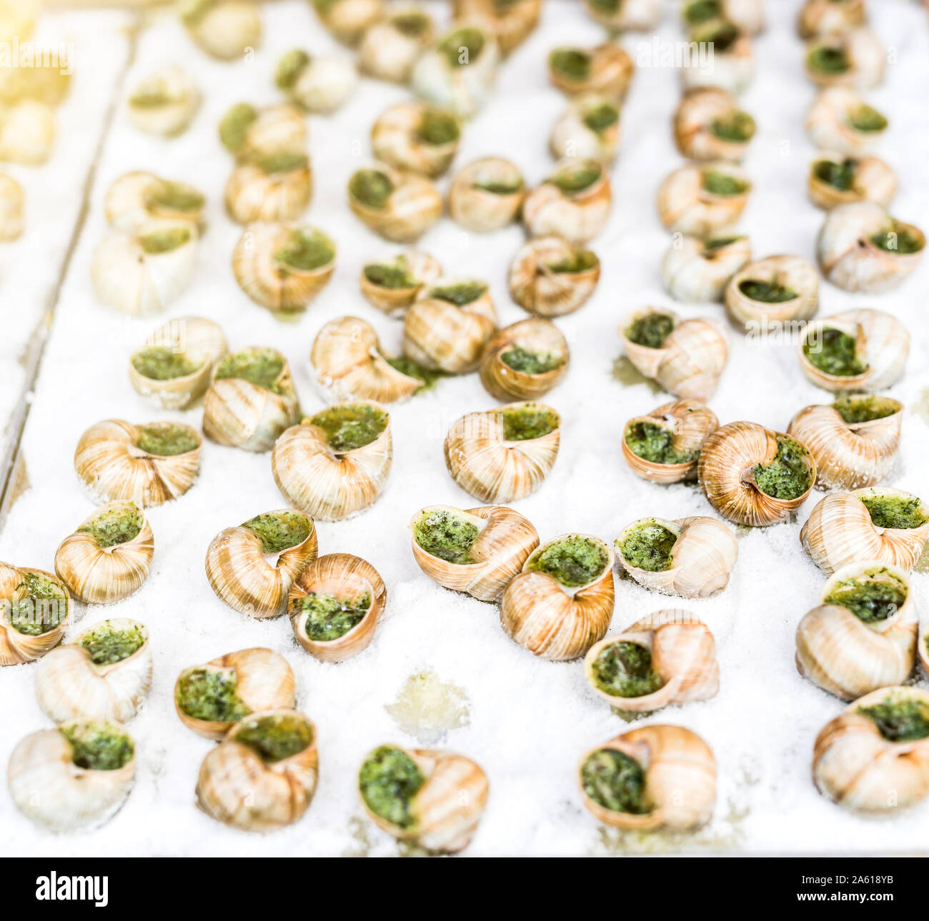 cooked snails with garlic sauce Stock Photo Alamy