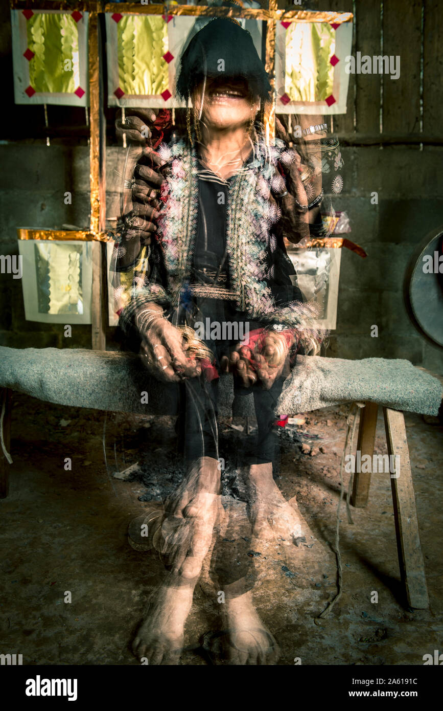 Hmong shaman performing a ritual in Khun Sathan, Nan, Thailand Stock ...