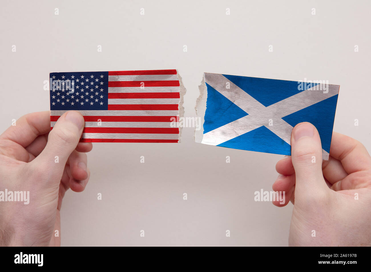 USA and Scotland paper flags ripped apart. political relationship concept Stock Photo