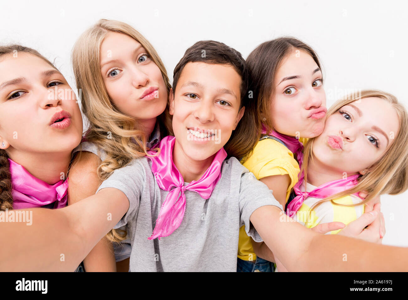 teenage smiling boy making selfie with cute funny girls Stock Photo - Alamy
