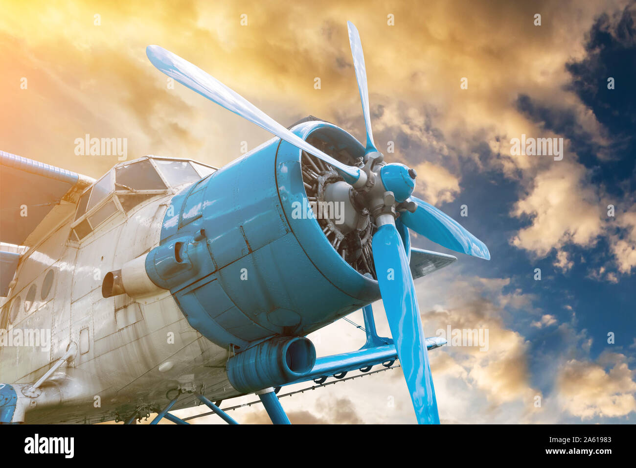 plane with propeller on beautiful bright sunset sky background Stock ...