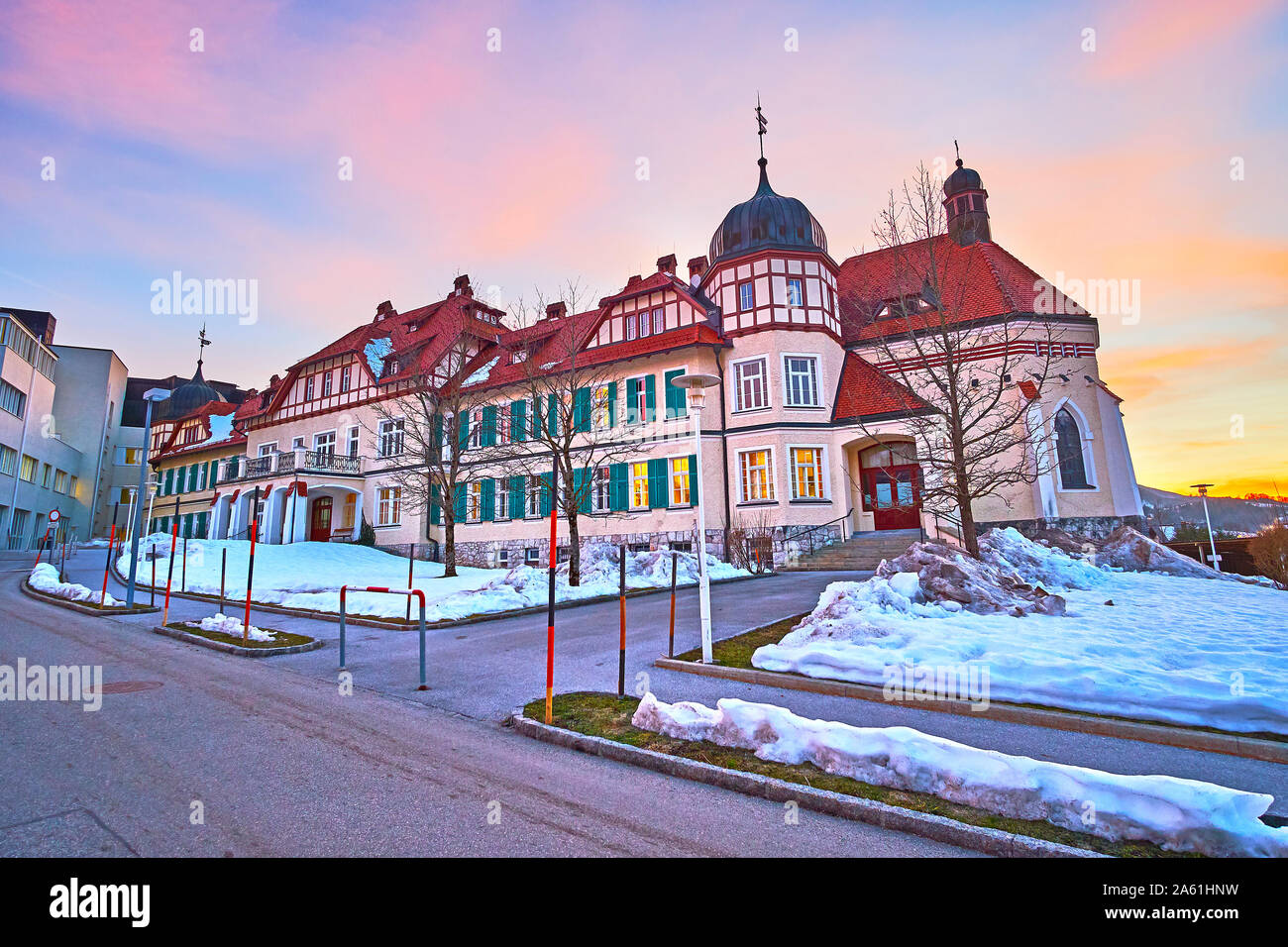 Exterior of old Kaiserin Elisabeth Krankenhaus (hospital) on colorful winter sunset, Bad Ischl, Austria Stock Photo