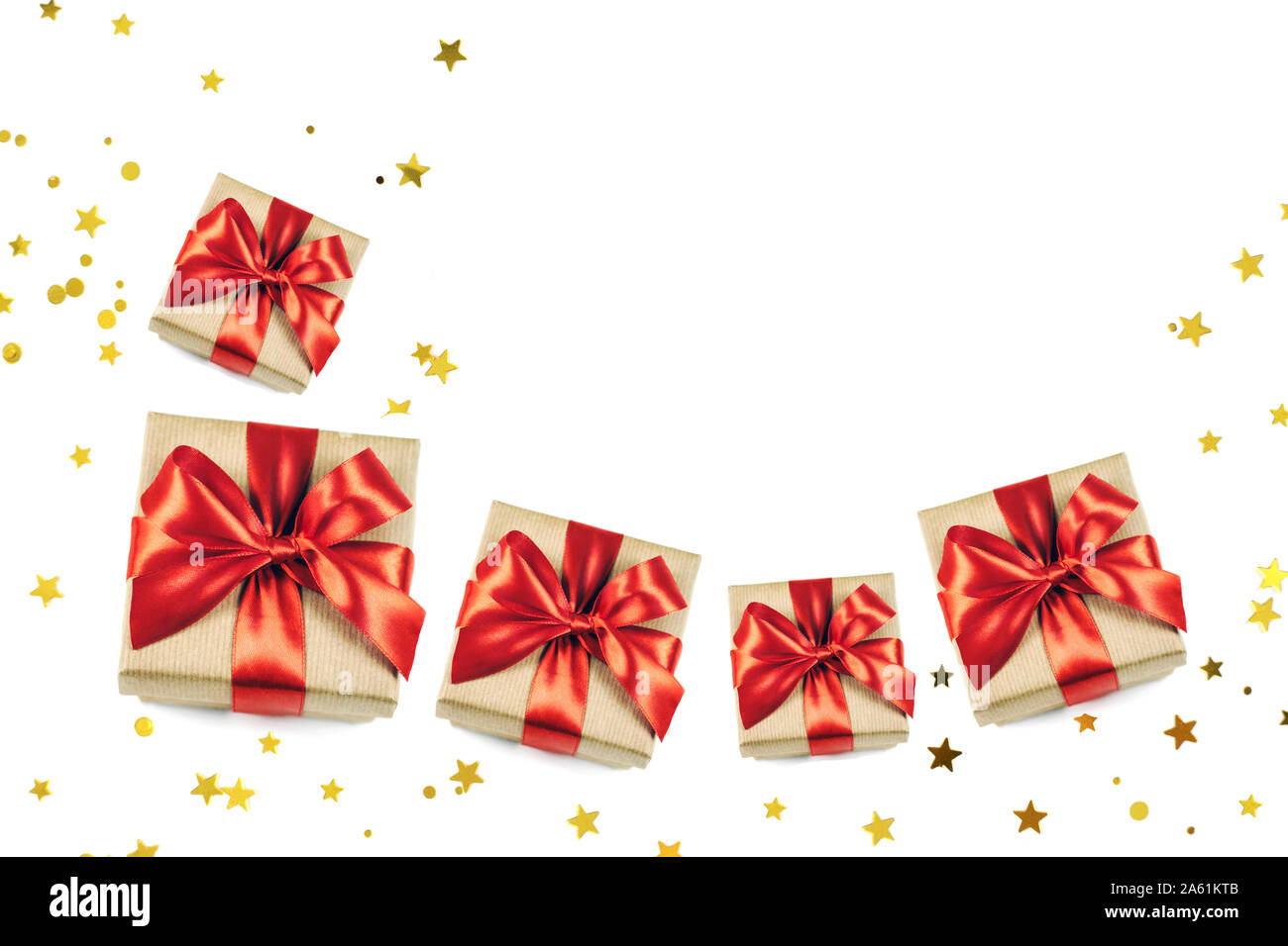 Festive gift boxes with red ribbon bow isolated on white sparkling ...