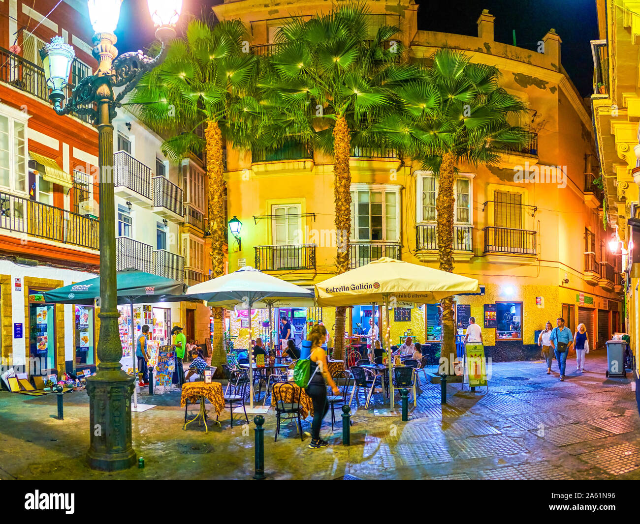 CADIZ, SPAIN - SEPTEMBER 19, 2019: The cozy outdoor restaurant in the tiny Antonio Martin square in a maze of medieval streets in Cadiz is a fine plac Stock Photo