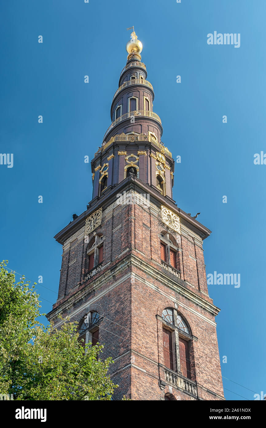 The Church of Our Saviour is a baroque, 17th-century place of worship with a carillon & steps around the outside of the spire. Stock Photo
