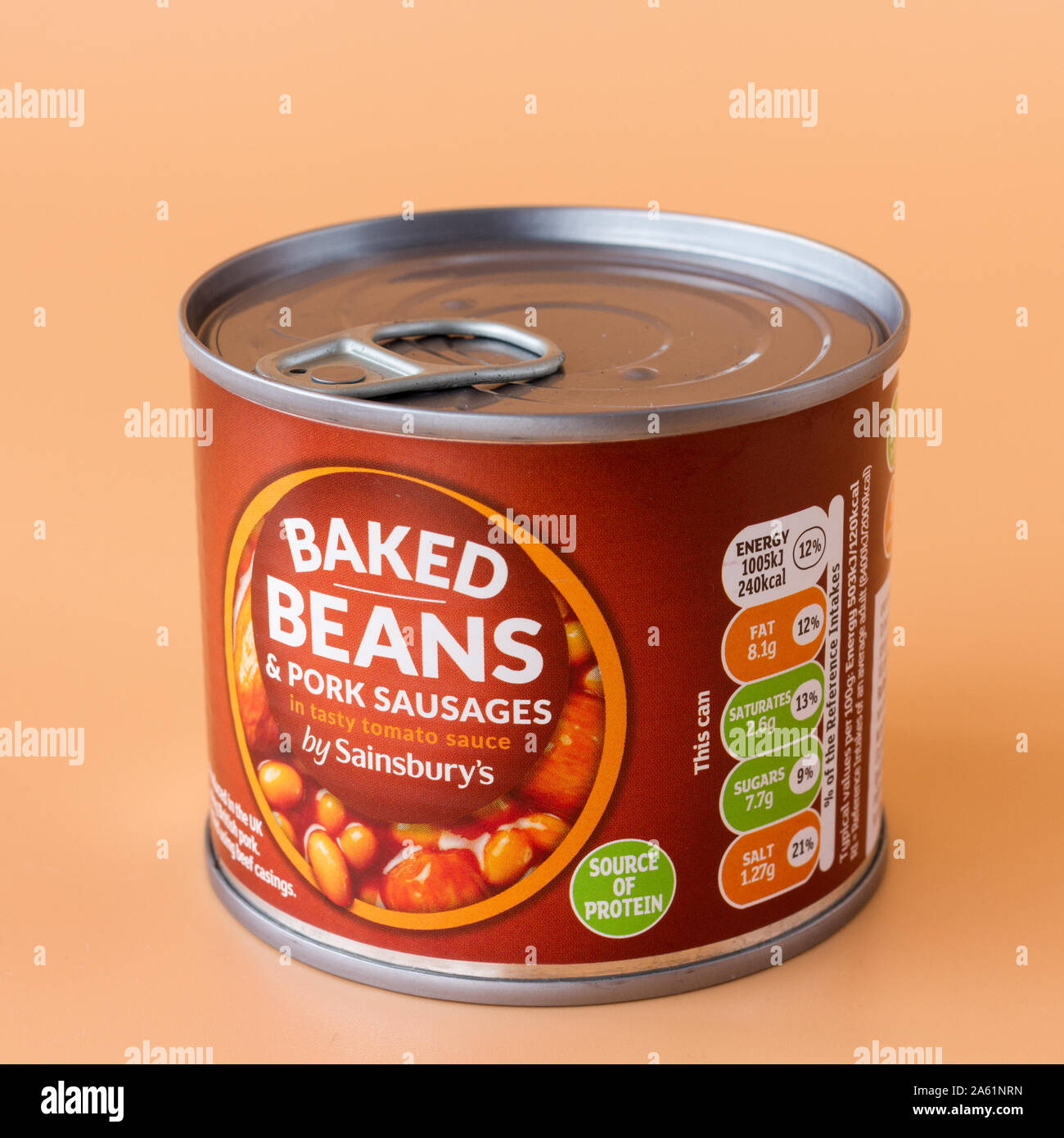 Small 200g tin of baked beans & pork sausages by Sainsburys. UK Stock Photo