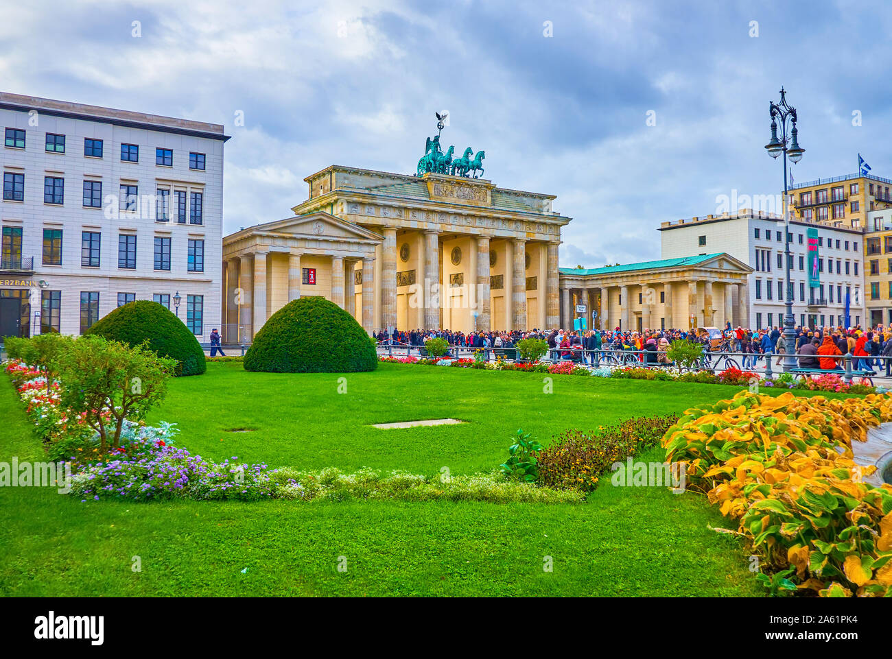 BERLIN, GERMANY - OCTOBER 3, 2019: The view on magnificent Brandenburg Gate through the fountain's flowerbed on Pariser Platz, on October 3 in Berlin Stock Photo