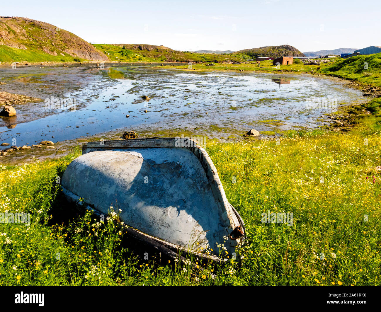 Old abandoned blue wooden fishing boat on the coast Stock Photo - Alamy