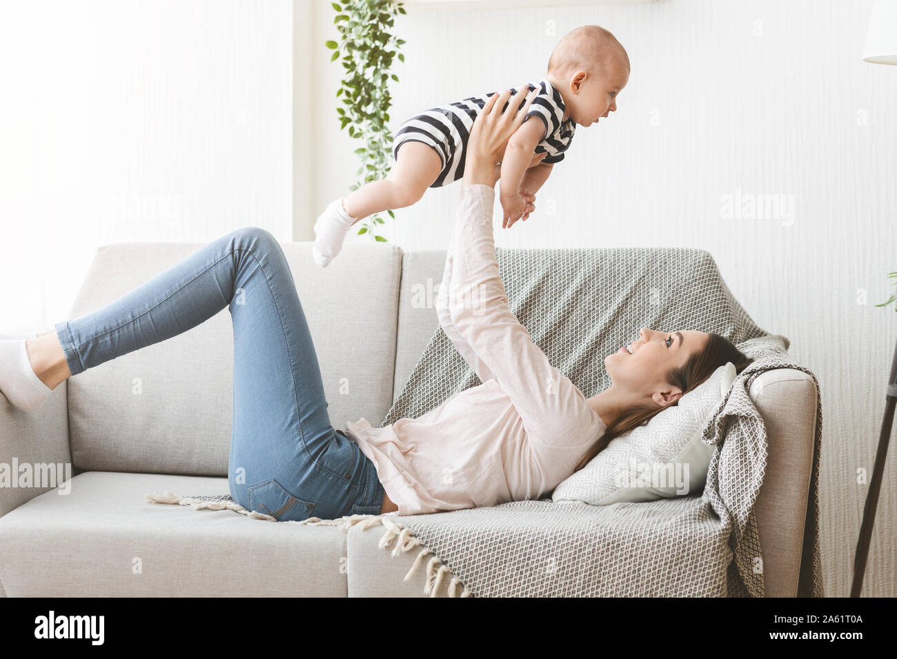Boy lifting girl hires stock photography and images Alamy