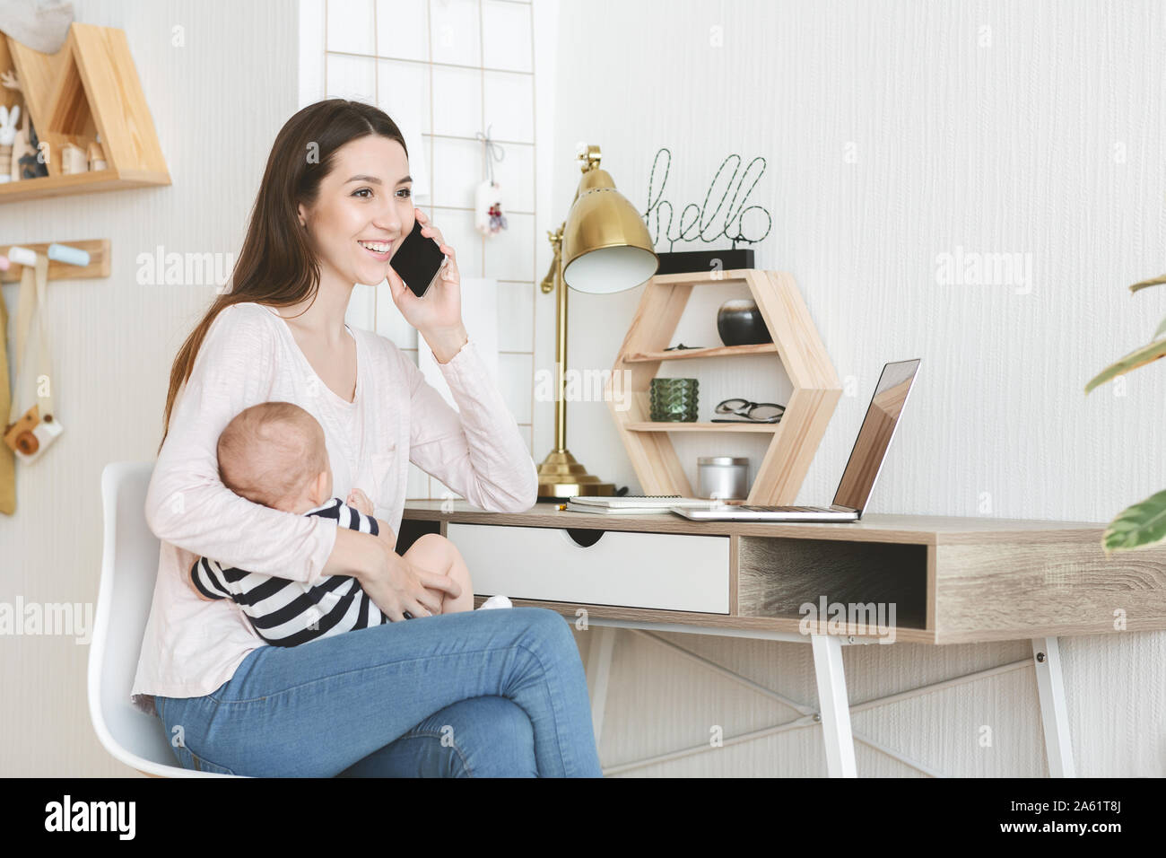 Cheerful young woman enjoying her maternity leave Stock Photo