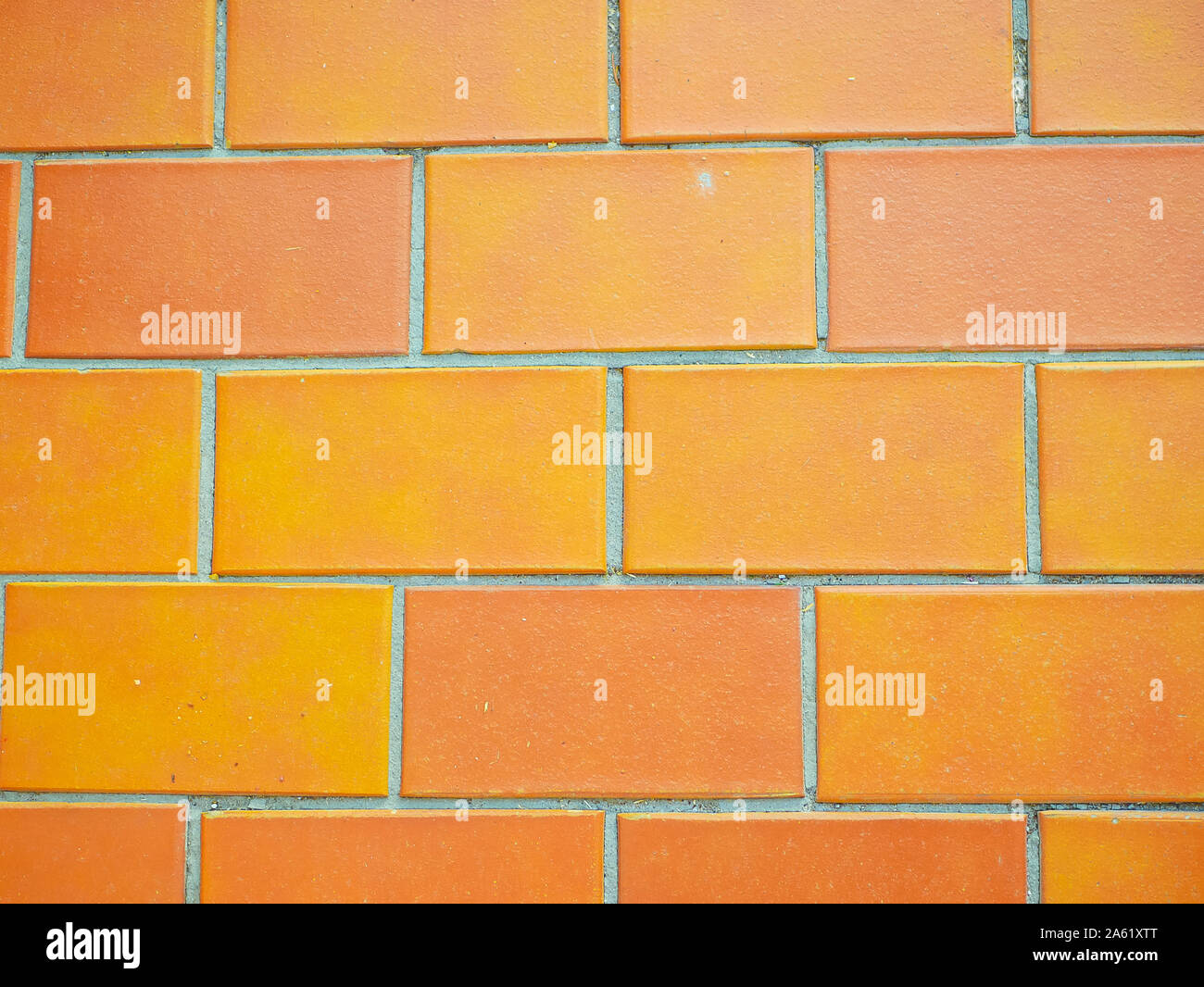 Orange wall tiles closeup. texture background. Orange Brick Wal Stock Photo Alamy