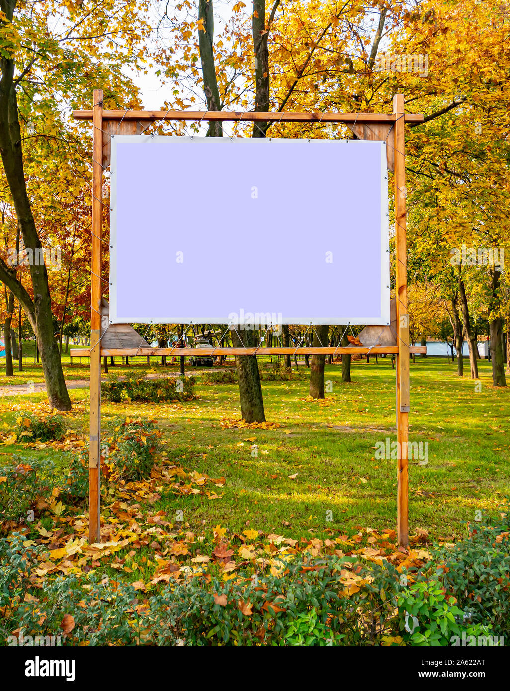 Billboard in the autumn public park. Place for text. Background Stock Photo  - Alamy