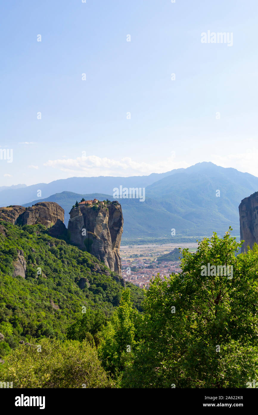 Monastery of Holy Trinity on one of the pillars of stone amongst the geology and huge rocks of Meteora, Greece. Stock Photo