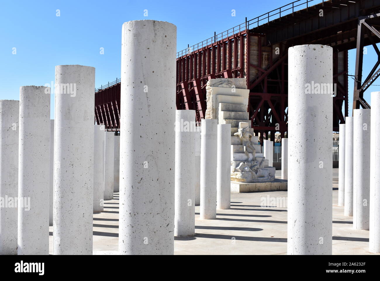 The holocaust memorial to 142 Almerian jews who died at Mauthausen concentration camp and  El Cable Inglés, an iron railway pier, Almeria, Spain Stock Photo