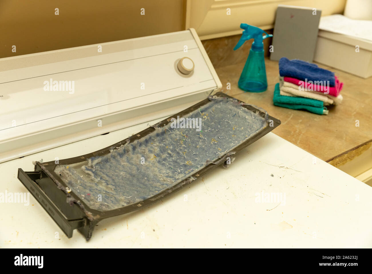 Dirty lint screen from clothes dryer Stock Photo Alamy