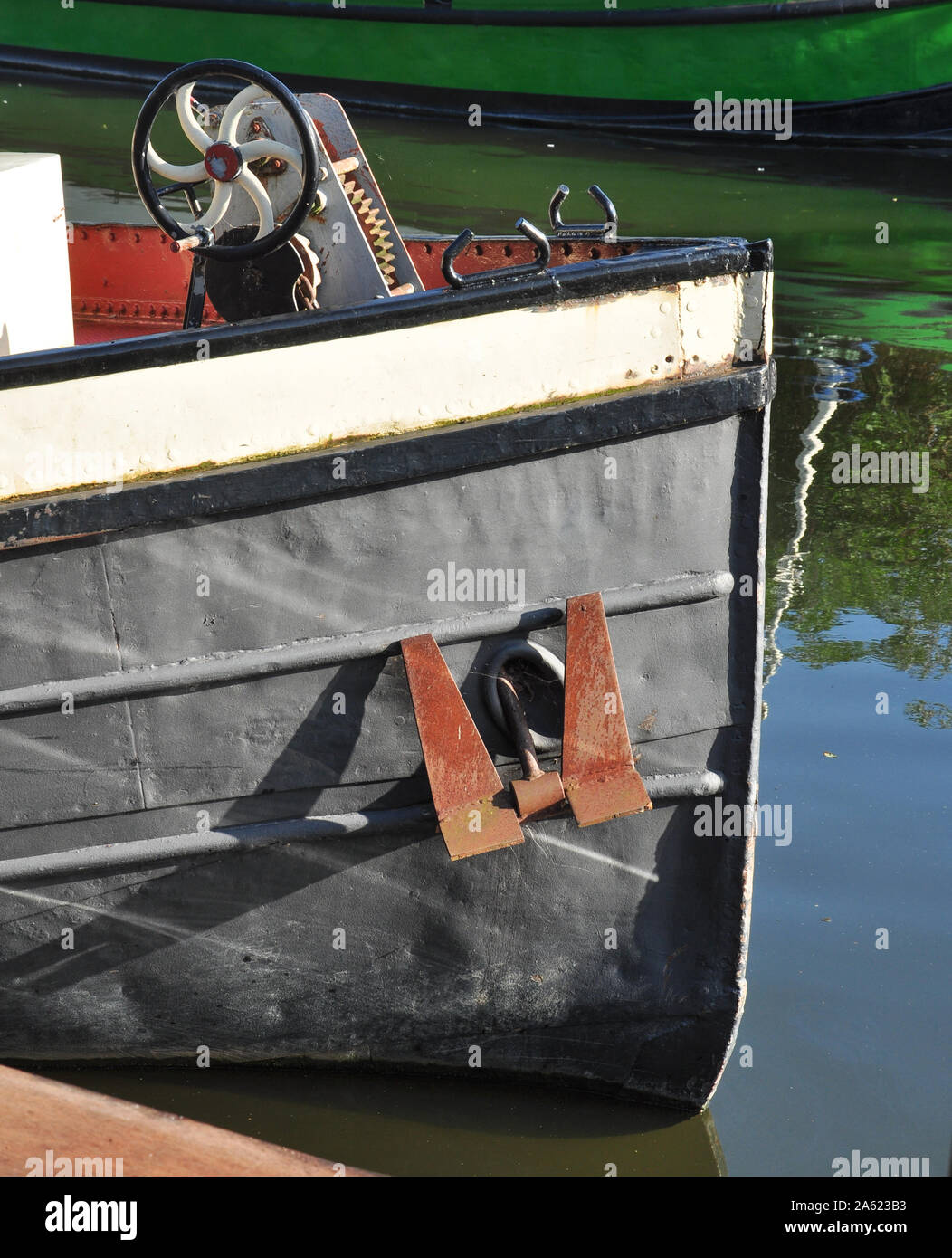 Bow and anchor of boat on the River Great Ouse, Ely, Cambridgeshire