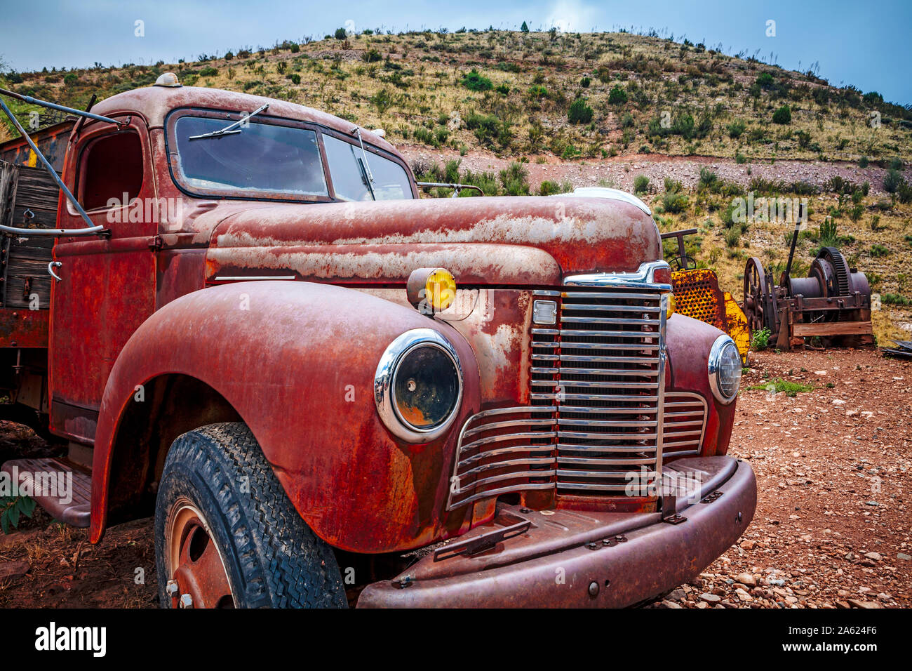 Salt Rusted Pick Up Large rusty old pickup truck rotting out in a field Stock Photo - Alamy