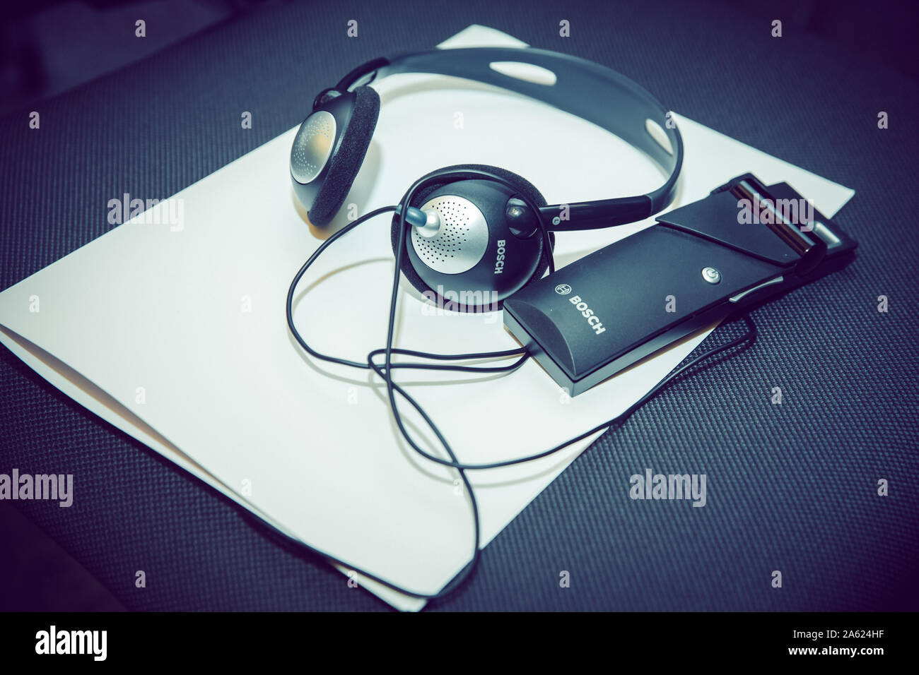 headphones used for simultaneous translation equipment simultaneous interpretation equipment . A set of headphones for simultaneous translation during Stock Photo