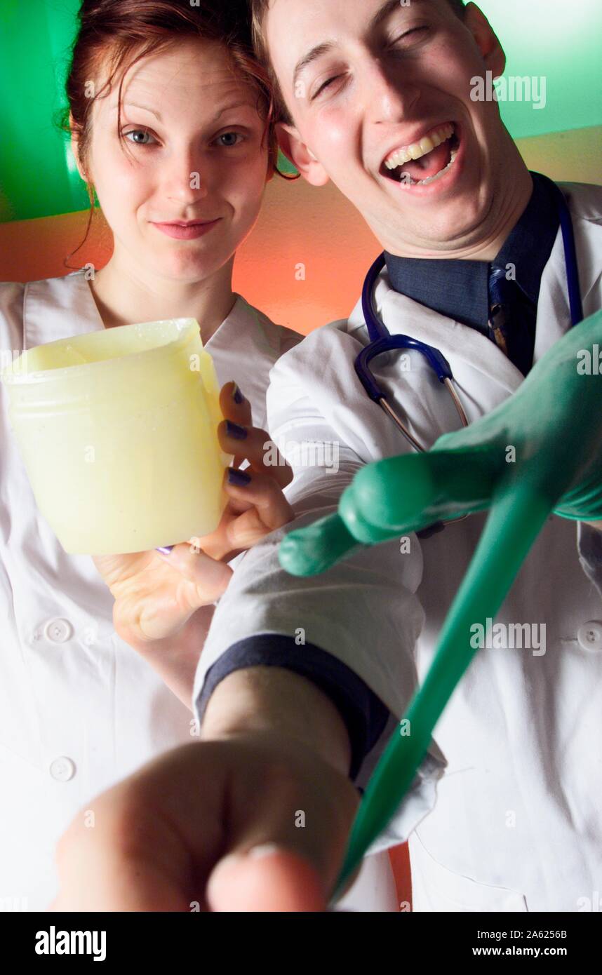 A humorous photo of a doctor and a nurse getting ready for a delicate ...