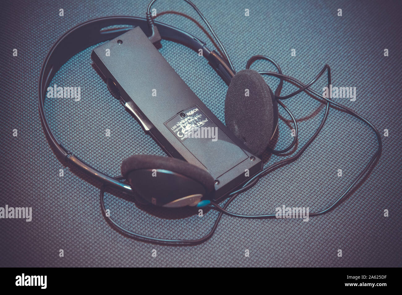headphones used for simultaneous translation equipment simultaneous interpretation equipment . A set of headphones for simultaneous translation during Stock Photo