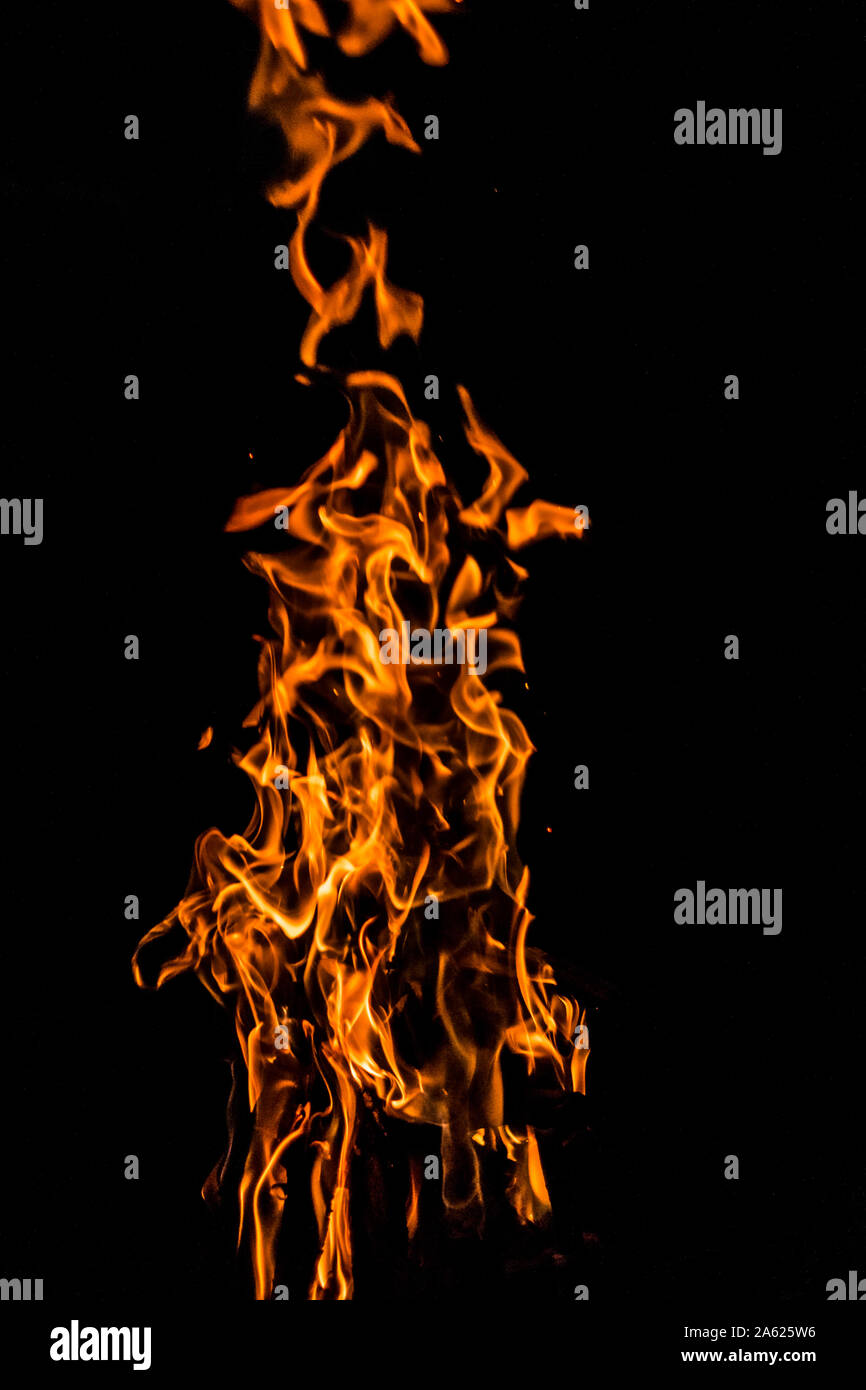 Dancing flames against a black background Stock Photo - Alamy