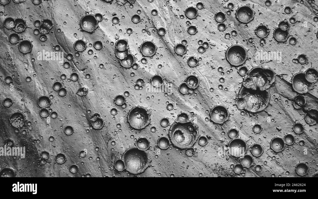 Small craters in mud, top view Stock Photo