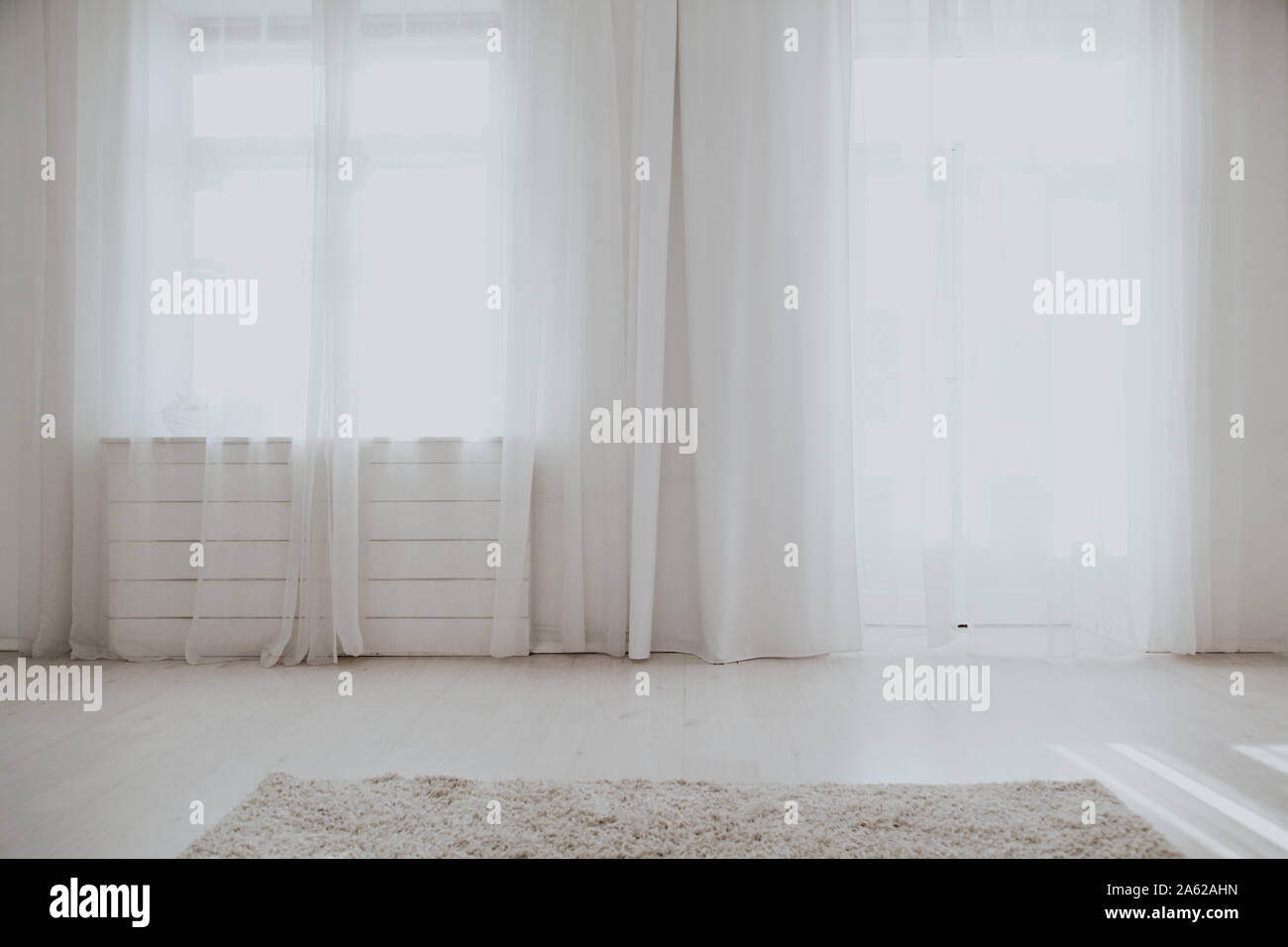 interior of an empty white room with windows Stock Photo - Alamy