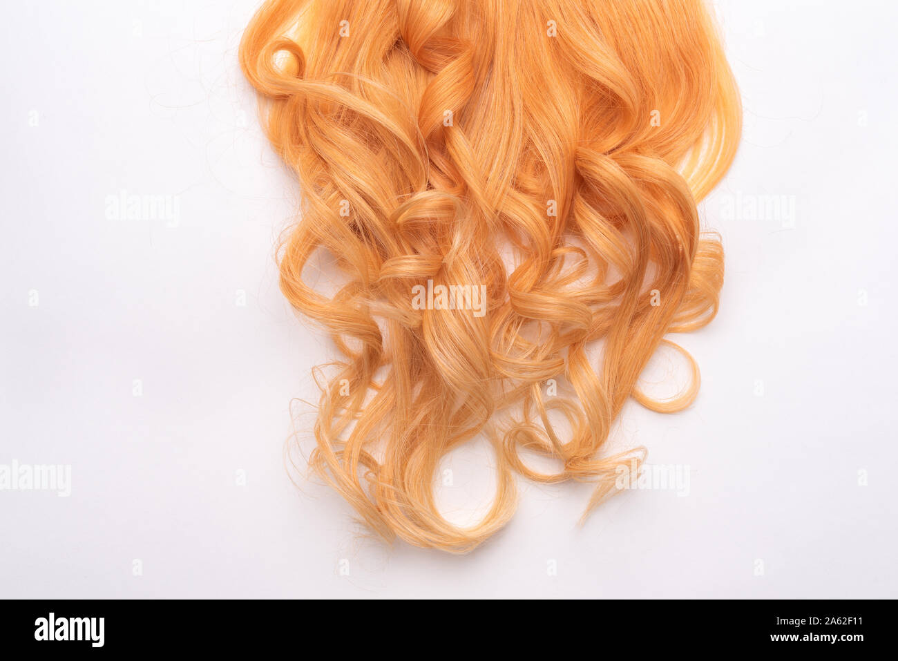 Human Natural Honey Colored Blond Hair On White Isolated