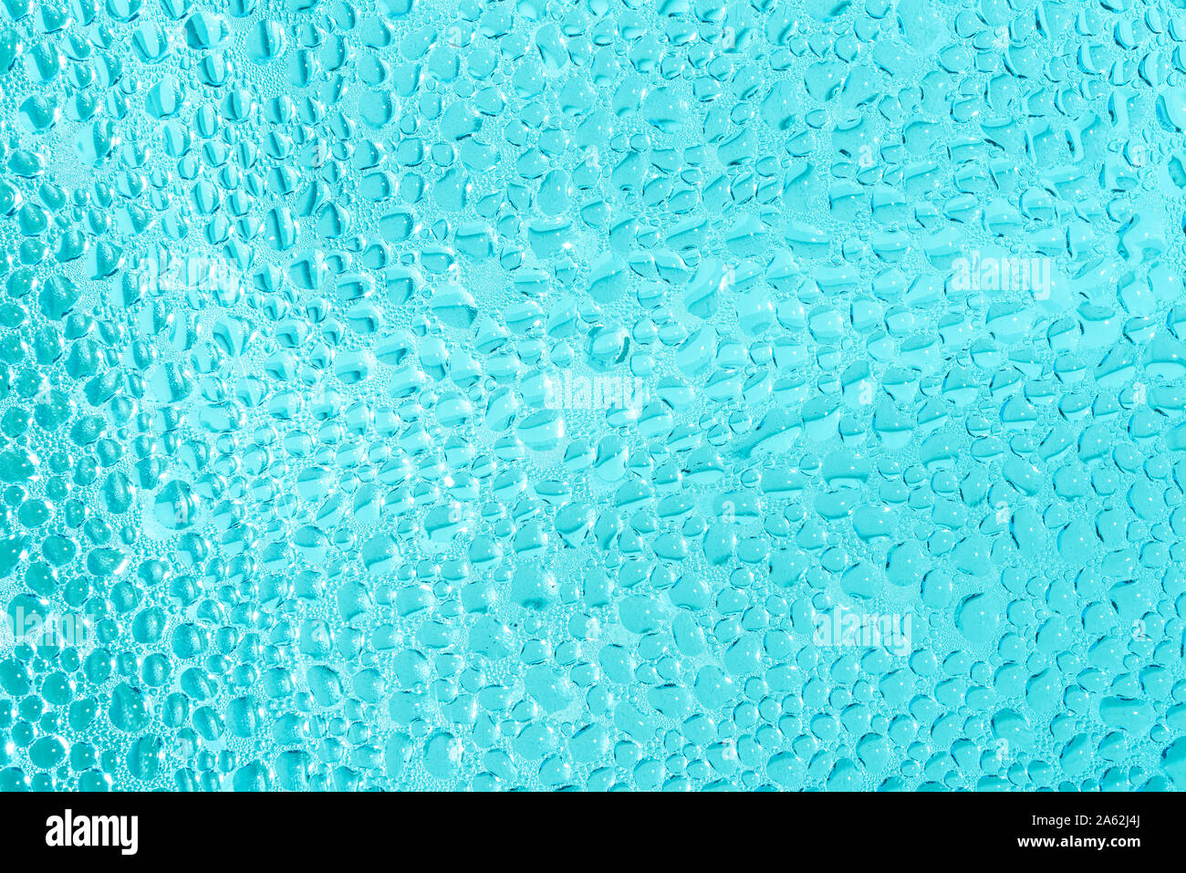 Blue swimming pool water drops and bubbles detail Stock Photo Alamy