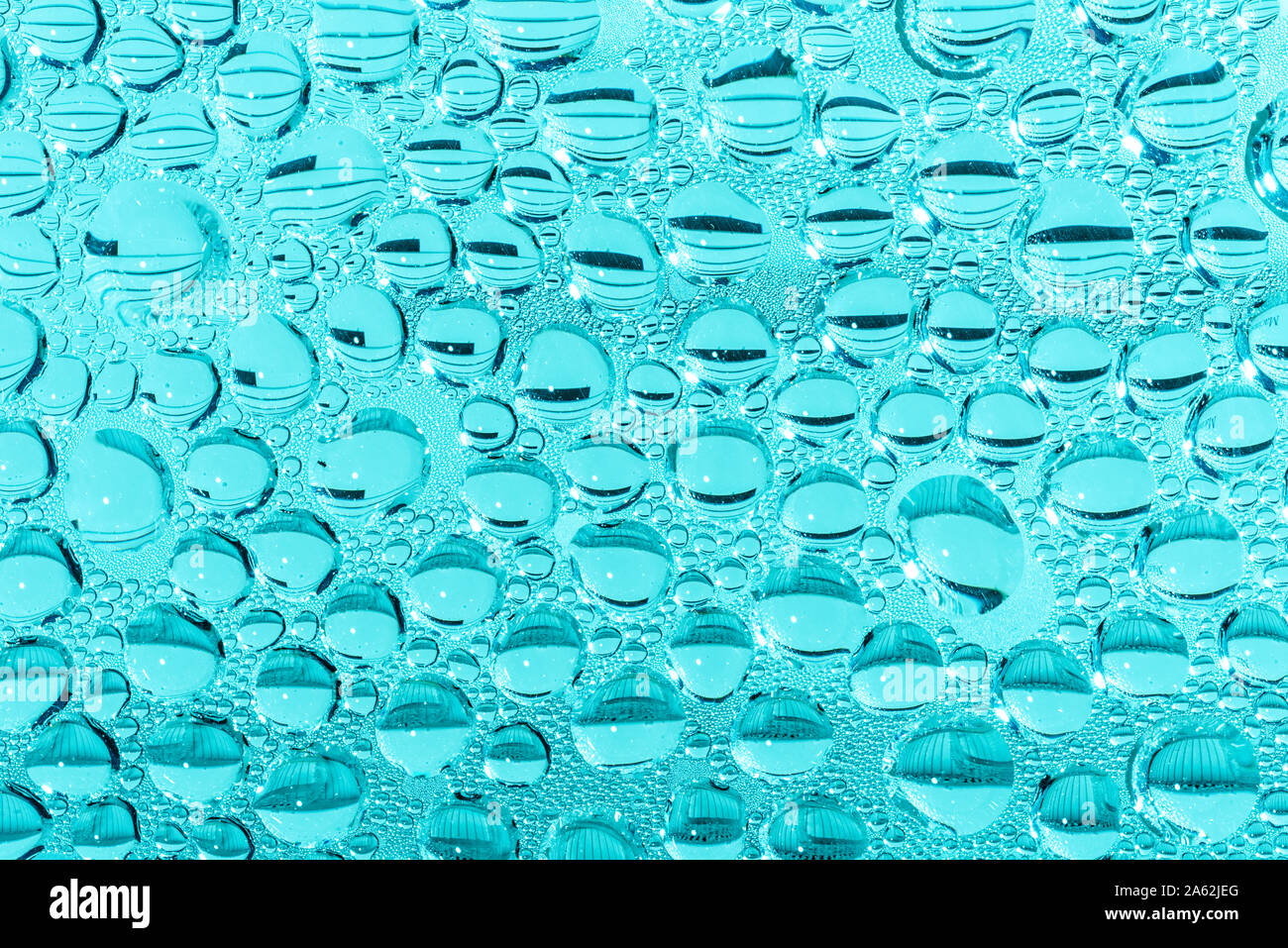 Blue swimming pool water drops and bubbles detail Stock Photo Alamy