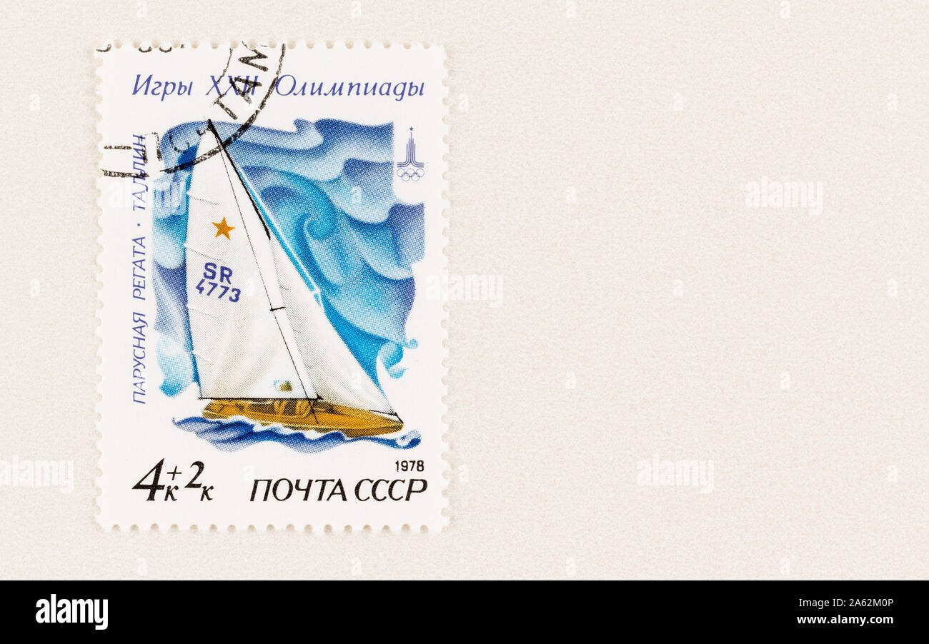 SEATTLE WASHINGTON - October 5, 2019: CCCP Olympic commemorative stamp with surcharge, featuring sailing event, with copy space. USSR stamp issued in Stock Photo