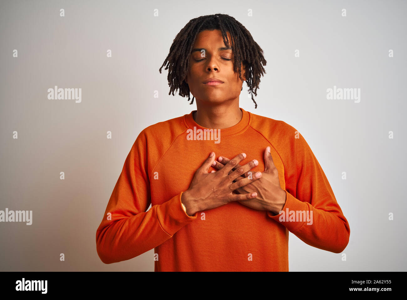 Dreadlocks Chest Afro american man with dreadlocks wearing orange sweater over isolated ...