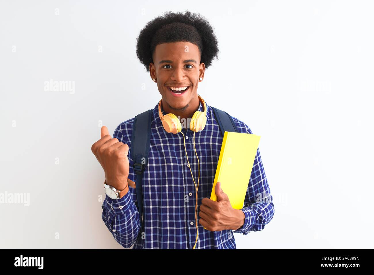 African american student man wearing headphones backpack over isolated ...