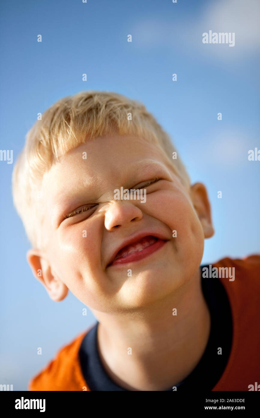 Blonde boy making face hi-res stock photography and images - Alamy