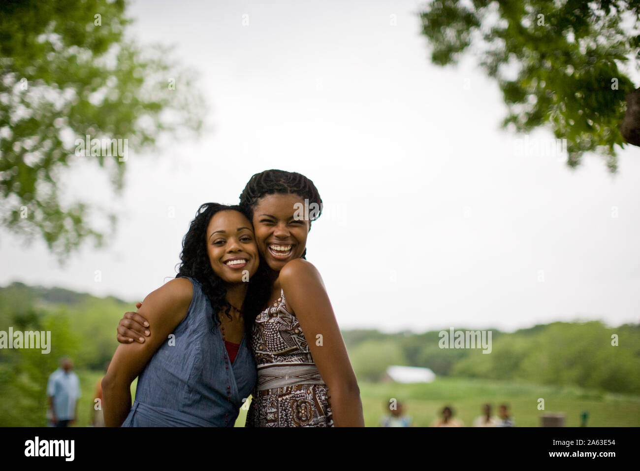 Two young women in park hi-res stock photography and images - Alamy