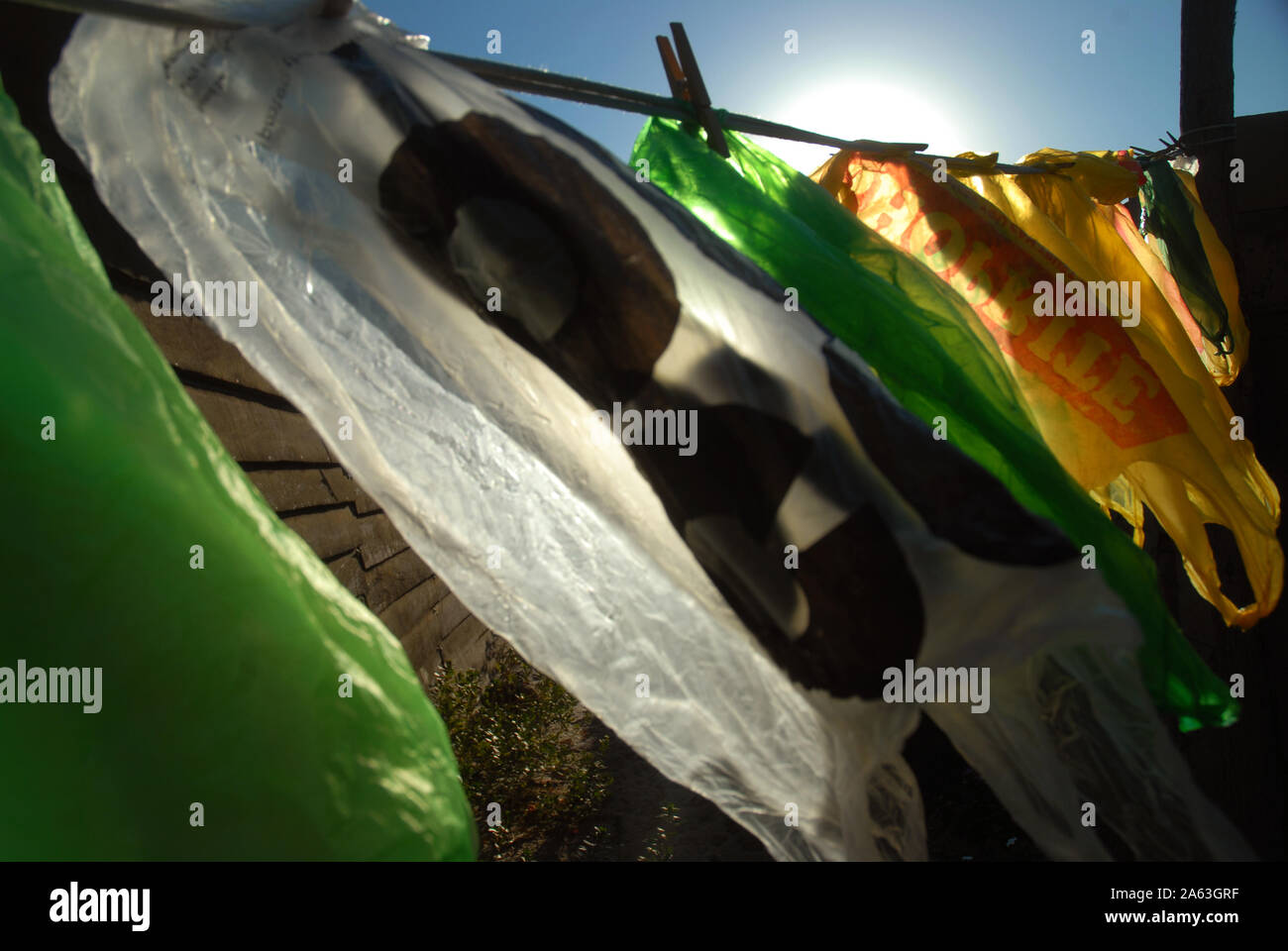 Plastic Bags hanging up on washing line, Mwandi, Zambia Stock Photo Alamy