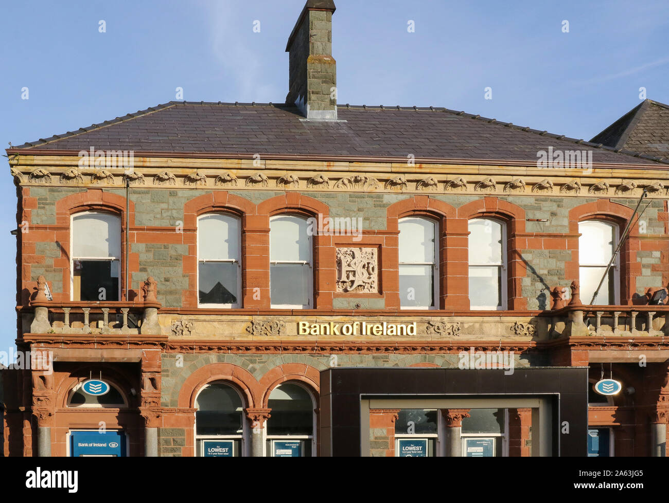 Front façade of a bank branch building in County Donegal, Ireland. Bank of Ireland, Letterkenny, County Donegal, Ireland. Stock Photo