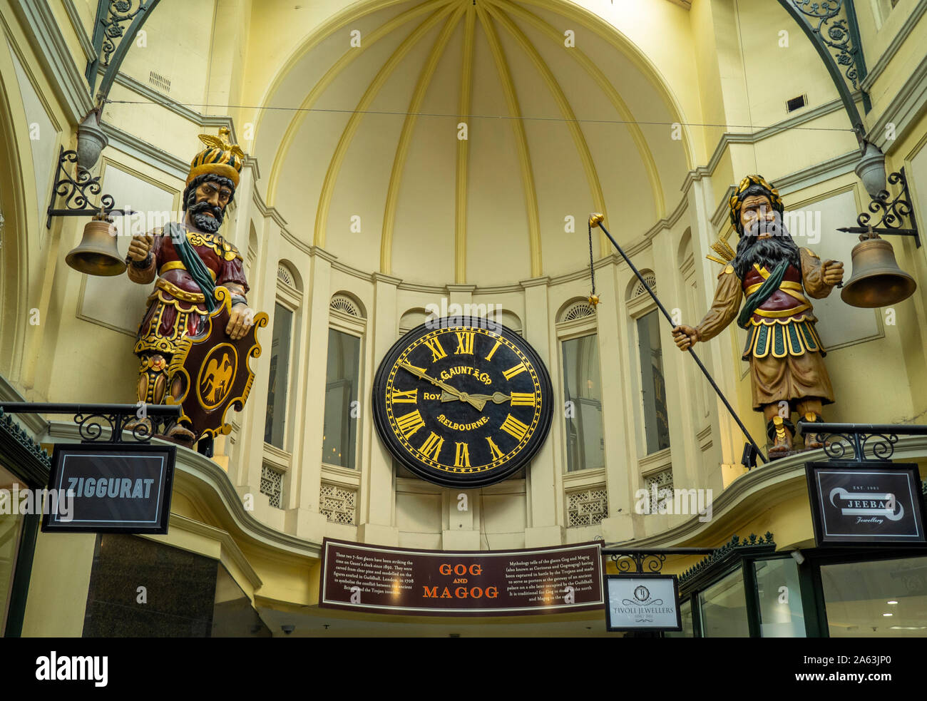 Gog and Magog statues either side of a Gaunt & Co clock in Royal Arcade Melbourne Victoria