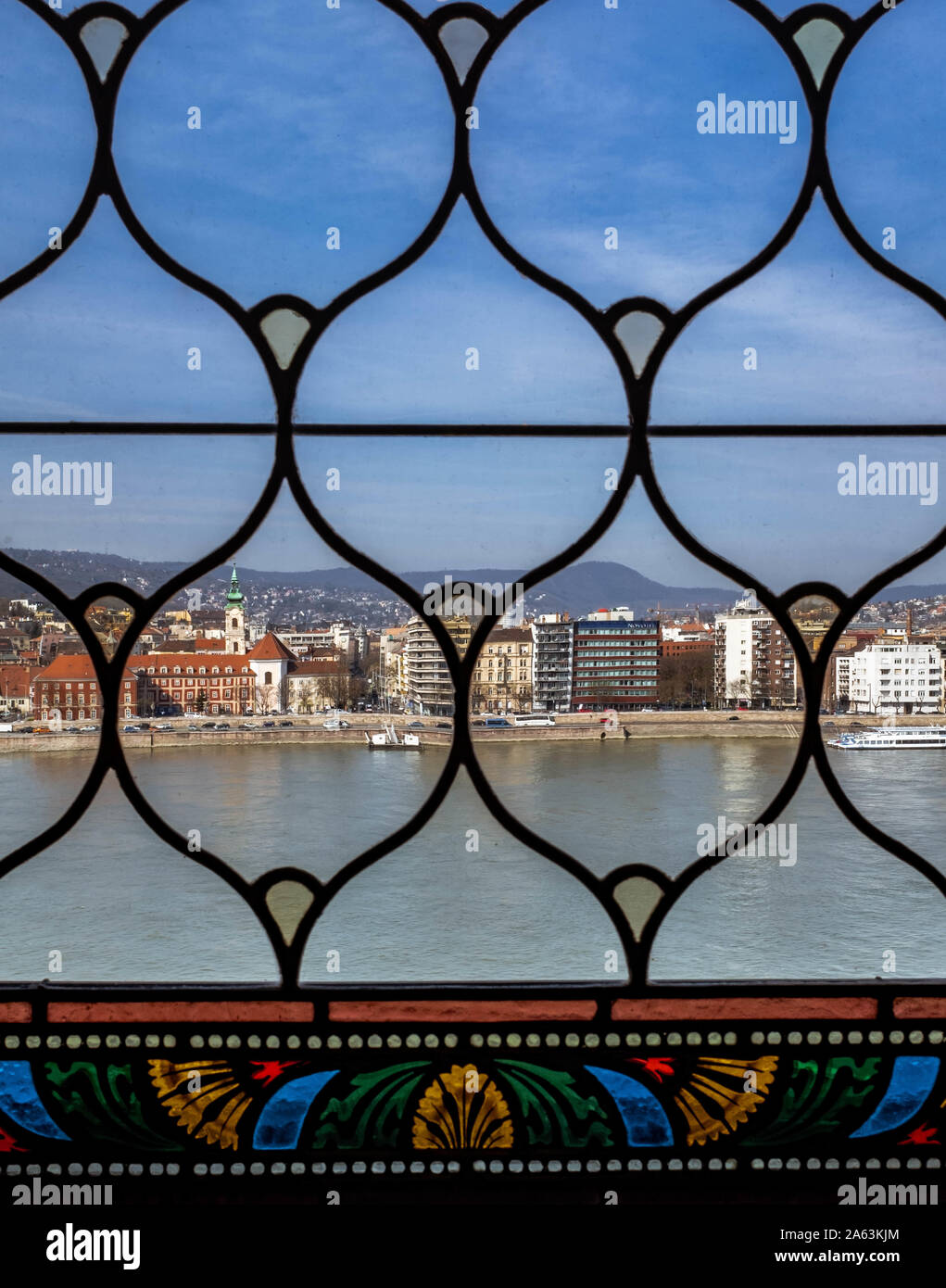 A view over Danube river and houses from Hungarian Parliament Building's window. Stock Photo