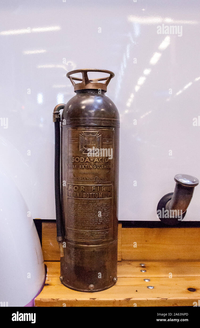 Punta Gorda, Florida, USA October 13, 2019 Antique Sodaacid fire extinguisher in a brass