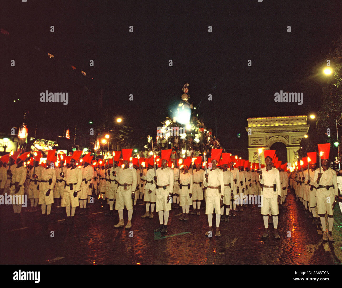 The Jean Paul Goude parade on the ,Champs-Élysées on the night of Bastille  Day . Photo by Dennis Brack 70 Stock Photo - Alamy